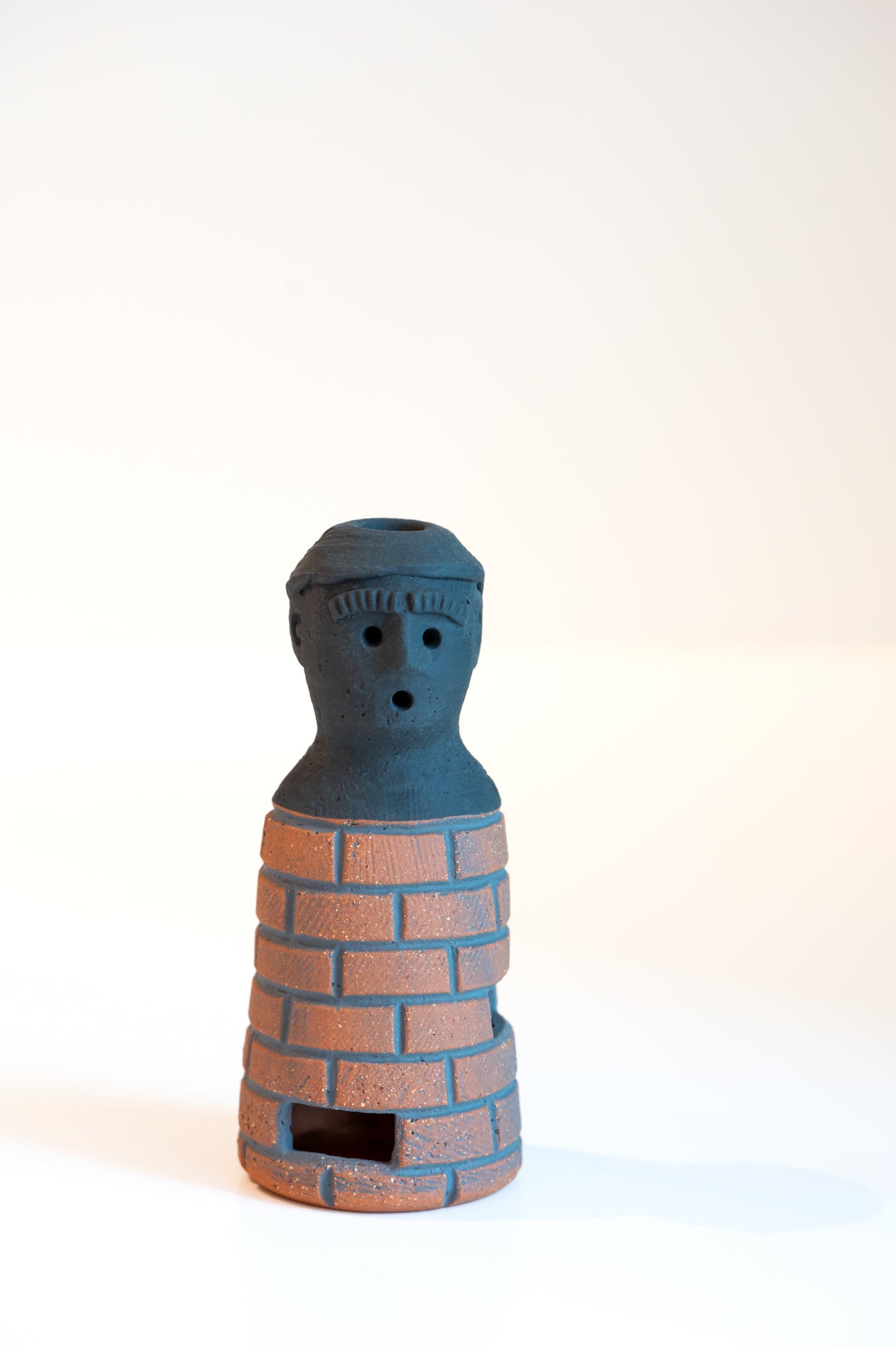 John Roy Bottle Man Bricks Surprised