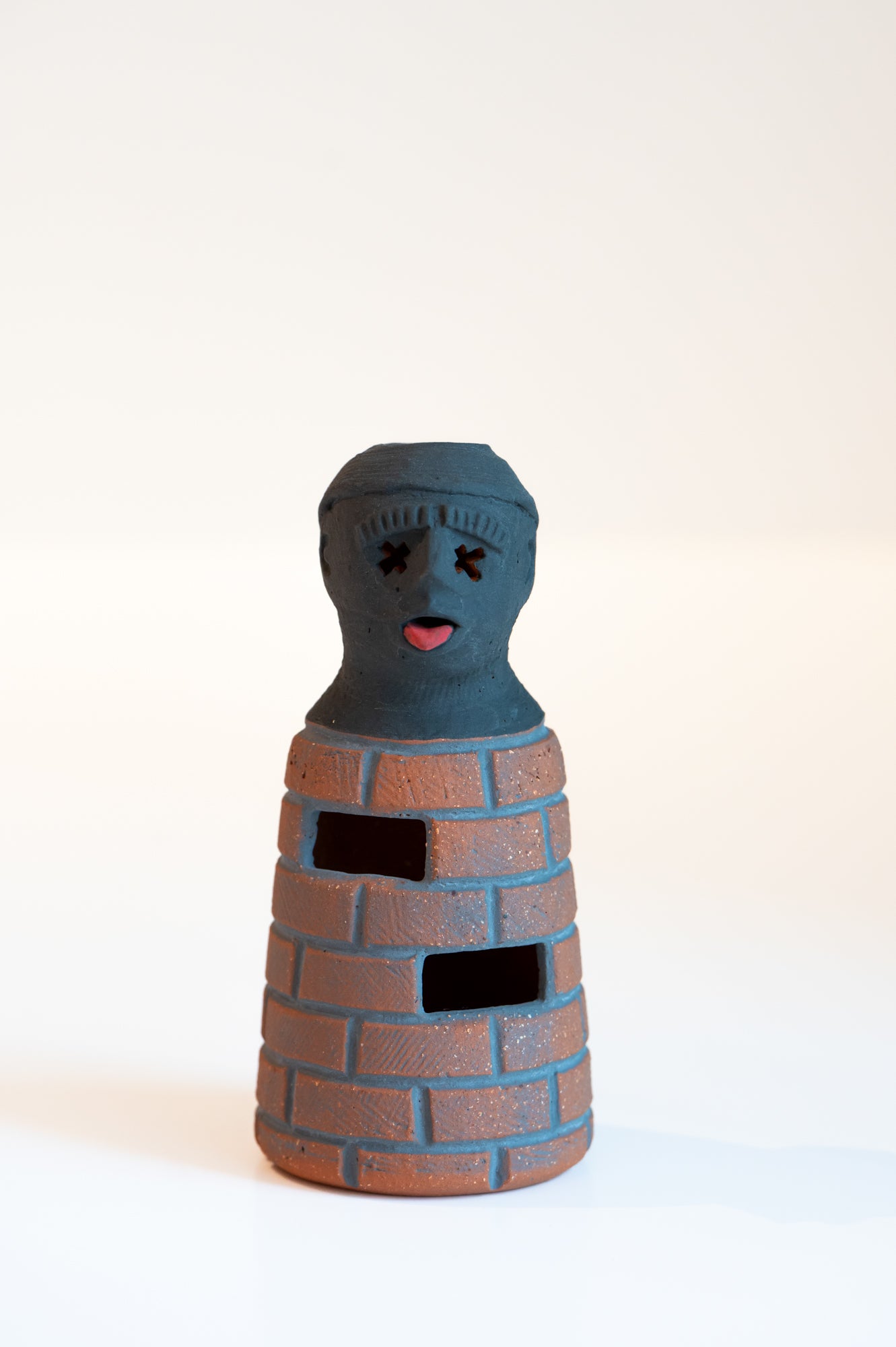 John Roy Bottle Man Bricks with Tongue Out Two Holes