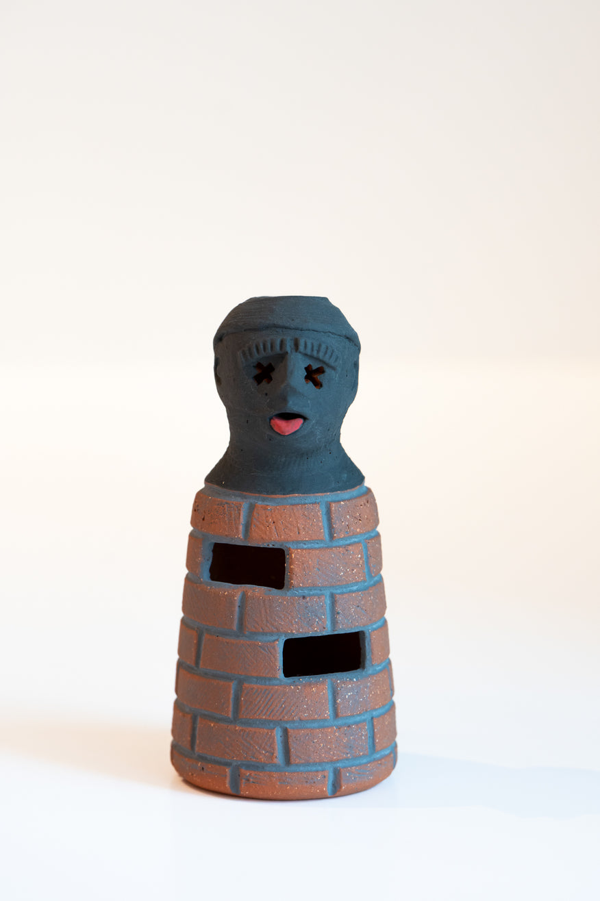 John Roy Bottle Man Bricks with Tongue Out Two Holes