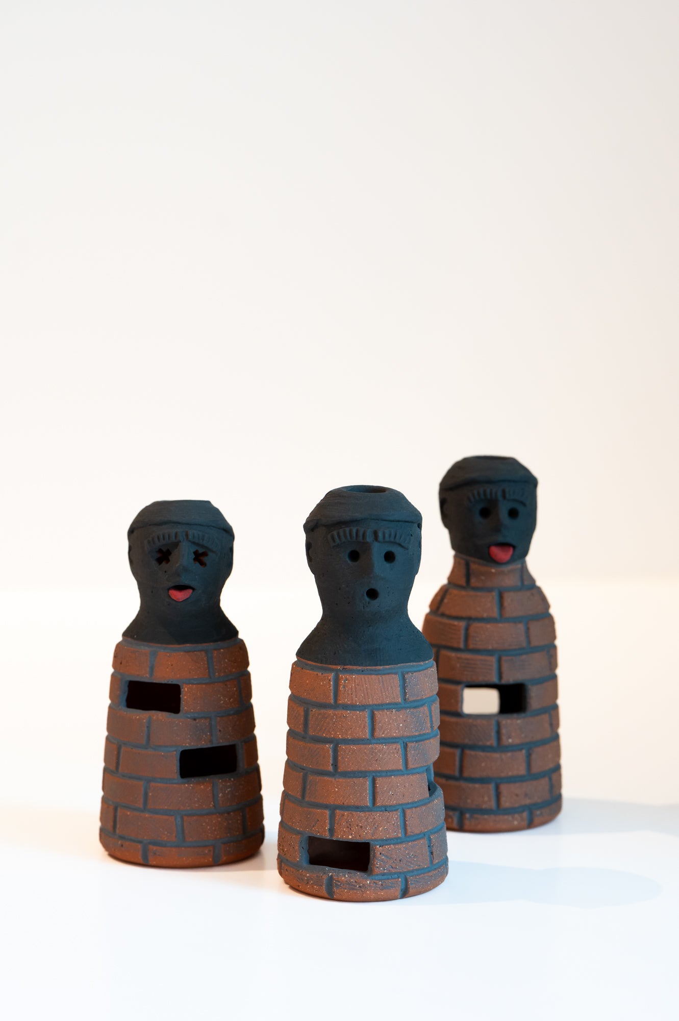 John Roy Bottle Man Bricks with Tongue Out Two Holes